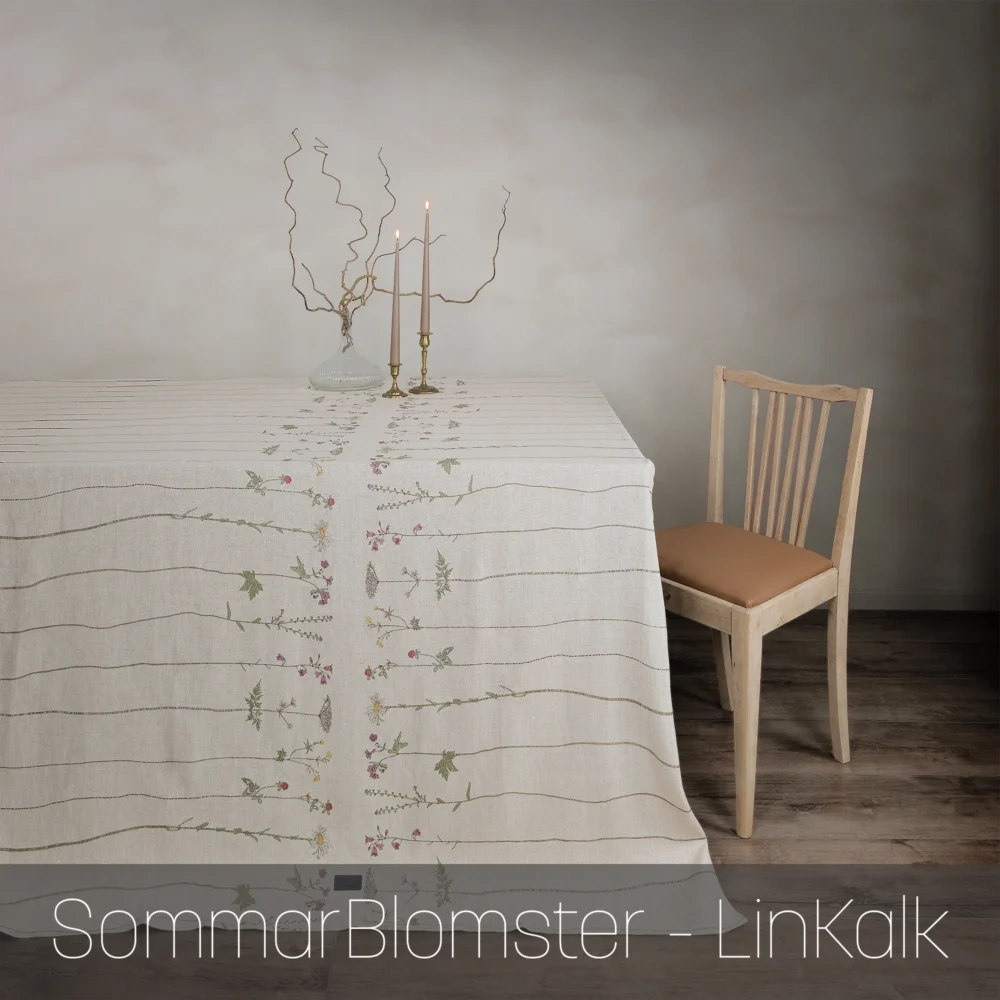 Bordsduk i linne med unik mönsterdesign SommarBlomster i färgen LinKalk från NORDRÅ Sweden. Svensk inredning och presenter